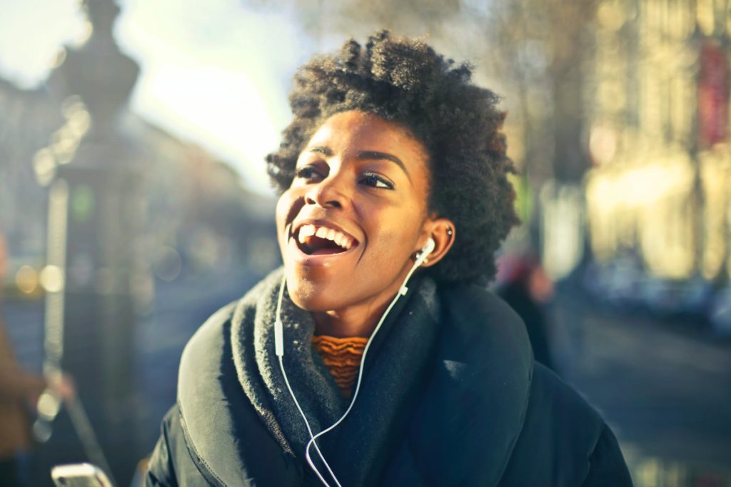 close-up-photo-of-a-woman-listening-to-music-yeshua-christian